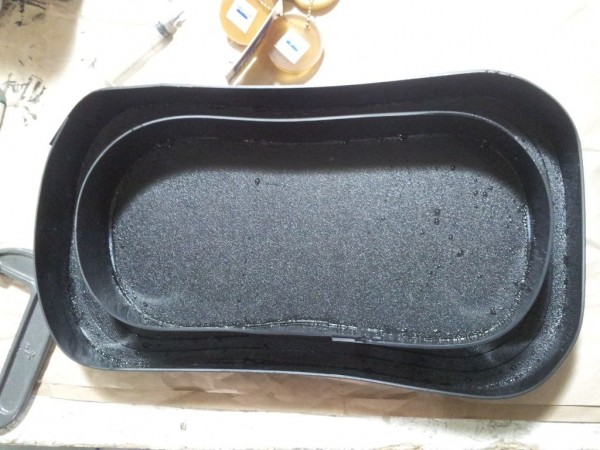 The empty mold. The water droplets are from the leak test; you don't want your mold leaking on you when you pour it.